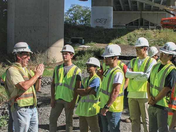 students learning about bridge repairs and structure at the civil engineering college