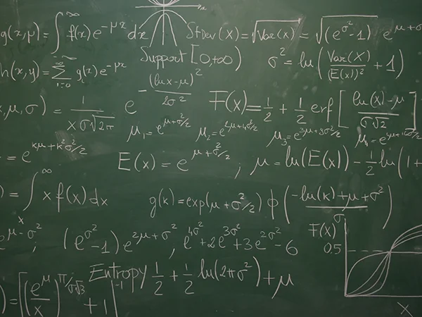 math degree students studying blackboard with mathematic equations on it