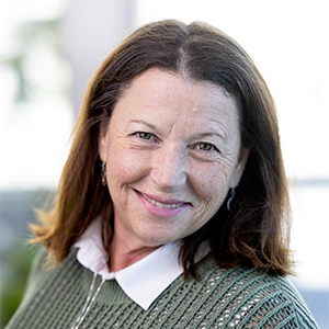 Portrait photo of Barbie Schmitt in professional attire.